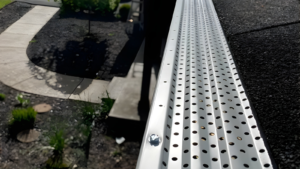 DIY gutter guards installation compared to professional gutter guard system on residential home