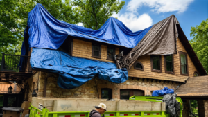 emergency roof repair on a tarped residential roof after storm damage in Mount Vernon Ohio