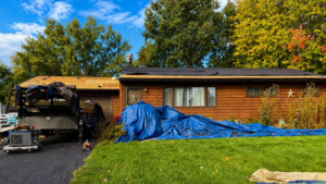 Property protection Ohio homeowners receive during roof replacement cleanup, including protection for landscaping and siding